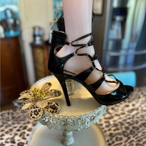Sexy black vinyl heels guaranteed to be a showstopper never worn size 9